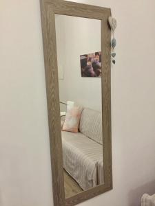 A bed or beds in a room at Residenza Sant'Orsola Azzurra Mazzini