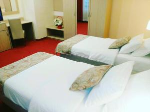 Letto o letti in una camera di Hotel N