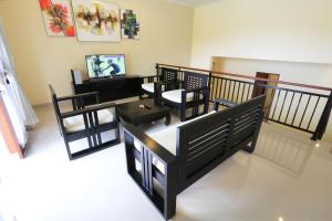 TV a/nebo společenská místnost v ubytování Luna Llena Villas