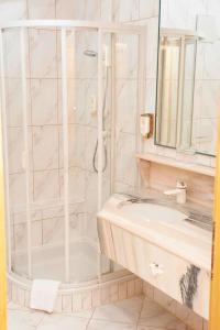 Koupelna v ubytování Hotel Lindner