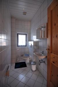 Kupatilo u objektu Haus Regenbogen
