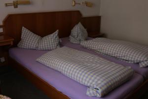 Postel nebo postele na pokoji v ubytování Hotel Ristorante Ätna