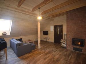 Uma área de estar em Cosy Holiday Home in Skrzynia with Terrace