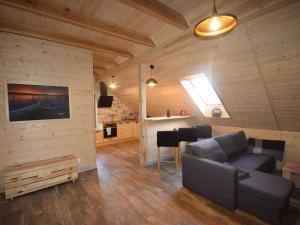 Uma área de estar em Cosy Holiday Home in Skrzynia with Terrace