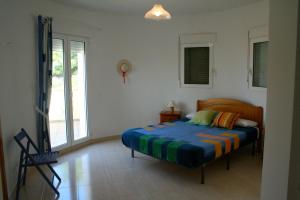 A bed or beds in a room at Eagle 2