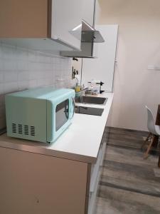 A kitchen or kitchenette at Domus Navigli