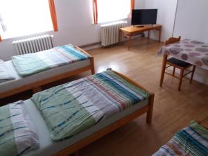 Posteľ alebo postele v izbe v ubytovaní U Nás - Apartmán Jelen