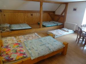Postel nebo postele na pokoji v ubytování U Nás - Apartmán Jelen