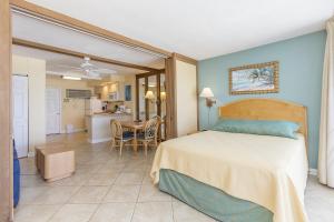 Postel nebo postele na pokoji v ubytování Sea Club IV Resort + 39 fotografií