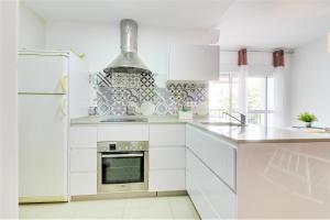 Køkken eller tekøkken på Apartamento Las Palmeras + 48 billeder