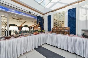 Restavracija oz. druge možnosti za prehrano v nastanitvi Marnas Hotels