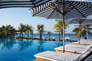 Bazén v ubytování Cassia Cottage Resort and Spa nebo v jeho okolí