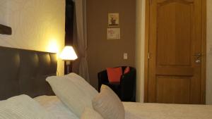 Postel nebo postele na pokoji v ubytování B&B Nord Sud
