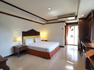 Krevet ili kreveti u jedinici u objektu Golden Villa Pattaya