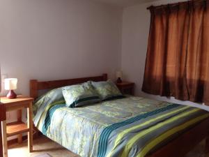 Postel nebo postele na pokoji v ubytování Cabañas Pun May