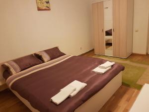 Postel nebo postele na pokoji v ubytování BigCitty Rooms