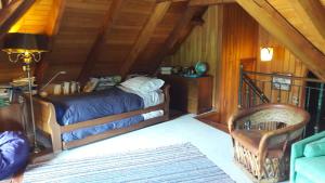 A bed or beds in a room at Great Chalet Farellones