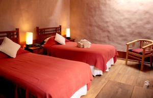 Ένα ή περισσότερα κρεβάτια σε δωμάτιο στο Hotel Kimal