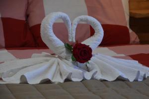 A bed or beds in a room at Privat Gazda Pension