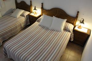 Cama o camas de una habitación en Lo Segador