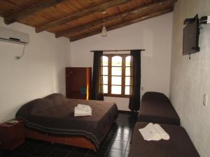 Giường trong phòng chung tại Cabañas Las Bahienses
