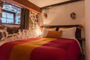 Postel nebo postele na pokoji v ubytování Casas da Fonte - Serra da Estrela