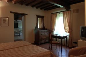 Posteľ alebo postele v izbe v ubytovaní Palazzo Loup Hotel