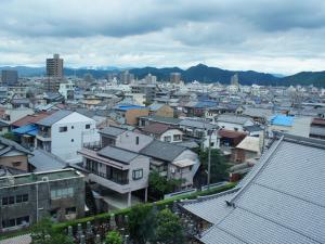 a view of a city with houses and buildings at Usyounoie Sugiyama in Gifu