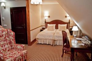 Posteľ alebo postele v izbe v ubytovaní Hotel St. Bruno