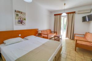Posteľ alebo postele v izbe v ubytovaní Marirena Hotel