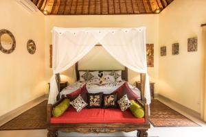 Łóżko lub łóżka w pokoju w obiekcie Bunut Garden Luxury Private Villa