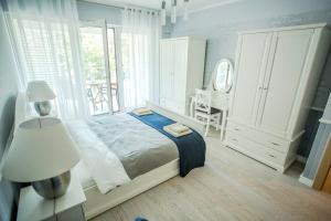 Posteľ alebo postele v izbe v ubytovaní Apartamenty Sun & Snow Playa Baltis z sauną