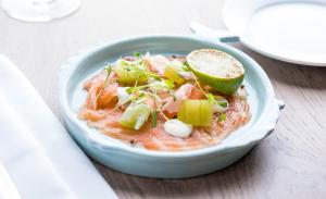 a bowl of salmon with a lime on top at The Swan Hotel in Southwold