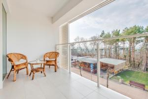 Balkón alebo terasa v ubytovaní Apartamenty Sun & Snow Playa Baltis z sauną