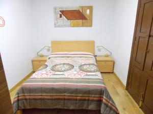 Postel nebo postele na pokoji v ubytování Apartamentos Capuchinas