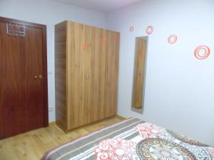 Postel nebo postele na pokoji v ubytování Apartamentos Capuchinas