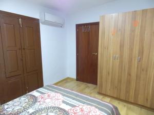 Postel nebo postele na pokoji v ubytování Apartamentos Capuchinas