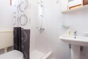 Kúpeľňa v ubytovaní Apartment Juranic + 20 fotografií
