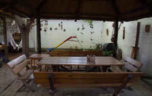 a table and chairs in a pavilion with a playground at Familia Tejada in Mendoza