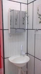 Um banheiro em Pousada Ana Raio