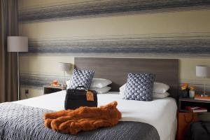 Voodi või voodid majutusasutuse Brandon House Hotel toas