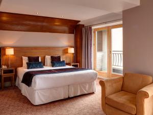 Posteľ alebo postele v izbe v ubytovaní Osprey Hotel