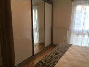 Posteľ alebo postele v izbe v ubytovaní New Stylish Apartment