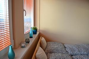Tempat tidur dalam kamar di Panorama View Family Apartment