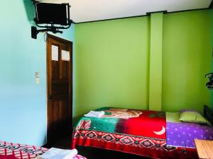 Letto o letti in una camera di Hostal Princesa Maria