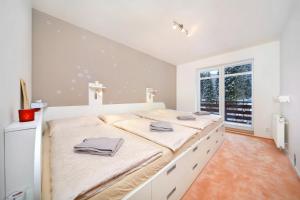 Posteľ alebo postele v izbe v ubytovaní Apartment Labská 108 Špindlerův MLýn