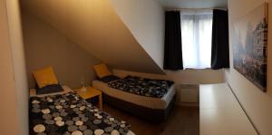 Postel nebo postele na pokoji v ubytování Apartmán NA SVAHU 3+KK, Dolní Morava