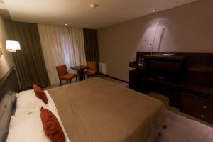 Cama ou camas em um quarto em Imago Hotel & Spa