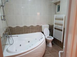 Koupelna v ubytování BigCitty Rooms