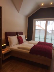 Łóżko lub łóżka w pokoju w obiekcie Ferienhaus Wind